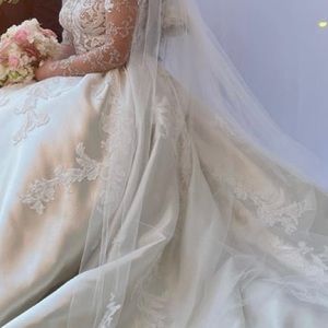 Cathedral length veil with lace crystal detail aplique one tier